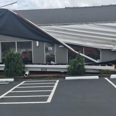 Hurricane,Damage,To,Office,Building